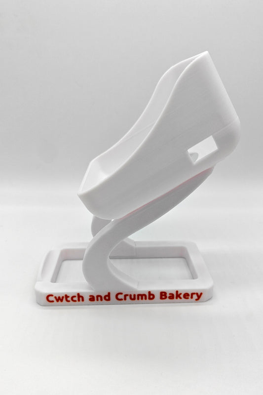 White SumUp stand with 'Cwtch and Crumb Bakery' branding