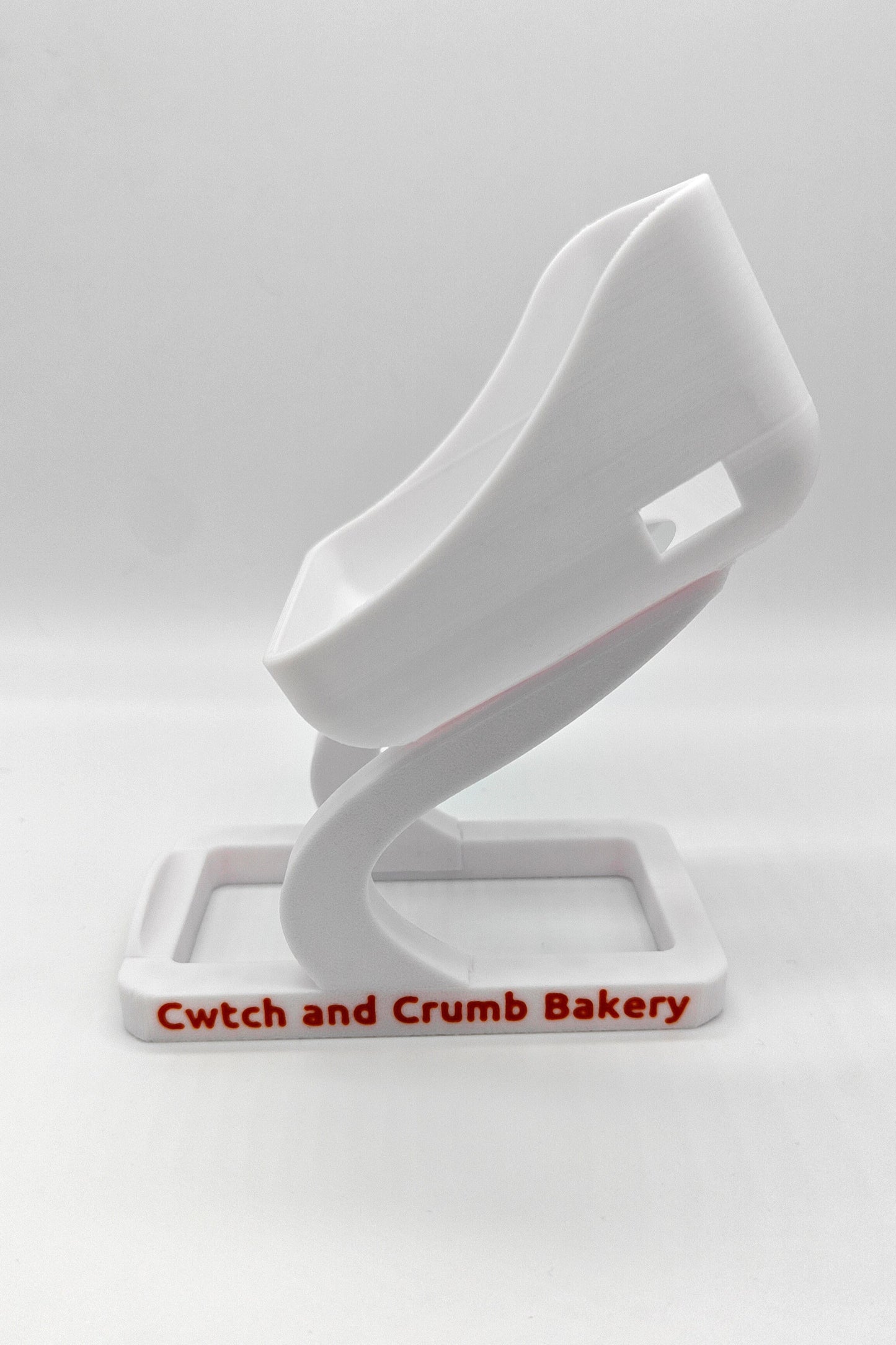 White SumUp stand with 'Cwtch and Crumb Bakery' branding 